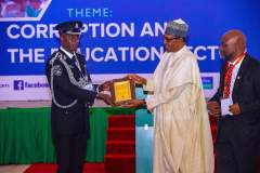 His Excellency President Muhammadu Buhari  recognising the recipient of the Public Service Integrity Award to Superintendent Daniel Itse Amah,