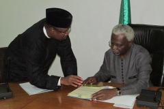 ICPC Chairman, Mr. Ekpo Nta, discussing with Managing Director of FHA, Professor Mohammed Al-Amin.