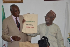 07-Hon.-Bako-Abdullahi-presenting-the-Commissions-publications-to-the-ANAN-President-Mr.-Nzom
