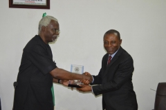 DSC_0930ICPC-Chairman-Mr.-Ekpo-Nta-presenting-a-commemorative-plaque-to-the-Auditor-General-of-the-Federation-Mr.-Anthony-Mkpe-Ayine-during-the-visit