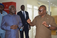 Secretary to the Commission, Dr. Elvis Oglafa (R) speaking with NACC Chairman, Rev. Massi Gams (L) during a tour of ICPC's training academy, the Anti-Corruption Academy of Nigeria (ACAN)