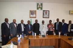 DSC_0065-ICPC-Chairman-Mr.-Ekpo-Nta-5th-L-and-Dr.-Mohammed-Sanusi-5th-R-in-a-group-photograph-with-ICPC-management-staff-and-NFF-officials