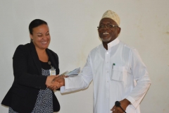 Hon.-Bako-Abdullahi-a-Board-Member-representing-the-ICPC-Chairman-Ekpo-Nta-welcoming-Mrs.-Rosalyn-Wiese-to-the-Commission