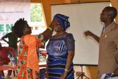 Mrs.-Rasheedat-Okoduwa-being-decorated-in-traditional-attire-by-women-of-Kwande