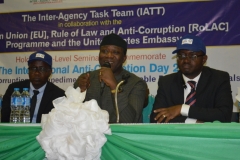 Dr. Kayode Fayemi, Hon. Minister of Mines and Steel Development [M]; Mr. Akingbolahan Adeniran, representative of the Vice President [R], during the 2017 International Anti-Corruption Day celebrations in Abuja