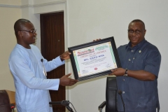 03-Mr-Onyima-presenting-a-Certificate-of-Credence-to-ICPC-Chairman-Ekpo-Nta-represented-by-the-Secretary-to-the-Commission-Elvis-Oglafa
