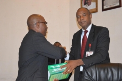 03-Mr.-Okechukwu-Igbudu-presenting-Mr-Paul-Erokoro-SAN-with-the-ICPC-Law-Report