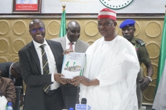 The Chairman ICPC, Dr. Musa Adamu Aliyu, SAN presenting ICPC publications to the Kano state government during the visit 