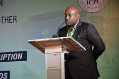 Speaker at the first session, Mr. Celestine Okeke, Lead Partner, Sustainable Entrepreneurship and Economic Development Initiative (SEEDi), delivering his paper on "Opportunity Cost of Corruption in People-Oriented Projects: Case Study of Zonal Intervention Projects in Nigeria," at the summit.