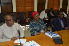 [L-R}: Prof. Sola Akinrinade, Provost, ACAN; Mrs. R.A. Okoduwa mni, Spokesperson for the Commission; Mr. Akeem Lawal, Head, CMED, during the presentation of the Anti-Corruption training materials at the ICPC headquarters in Abuja