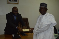 ICPC Chairman  presenting one of the nominees for the Integrity Awards  Hamza Adamu Buwaiwith his prize