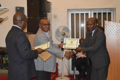 07-Secretary-to-the-Commission-Dr.-Elvis-Oglafa-presenting-the-Advanced-Digital-Forensic-Training-certificate-to-another-participant