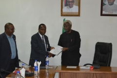 DSC_0101-ICPC-Chairman-Mr.-Ekpo-Nta-presenting-the-report-to-the-CMD-National-Hospital-Abuja-Dr.-Jaffar-Mommoh