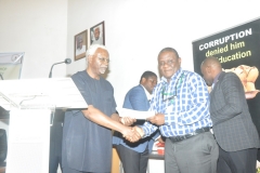 ICPC Chairman, Mr. Ekpo Nta, presenting a certificate to one of the participants