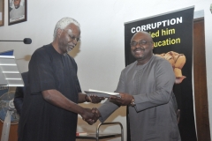 ICPC Chairman, Mr. Ekpo Nta, presenting a certificate to one of the participants